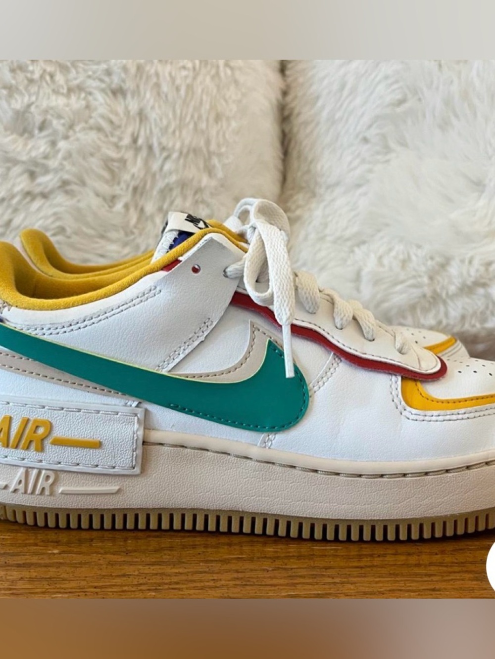 Nike Women's White Sneakers with Teal Swoosh and Yellow Trim
